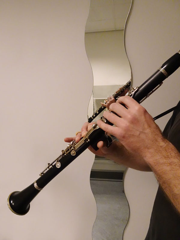 klarinet klarinettist spiegel pijnloos oefenen spelen musicus muziek instrument